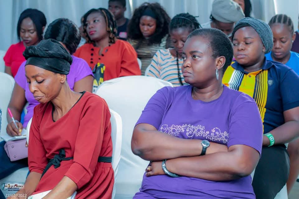 Women seated during an empowerment and training session